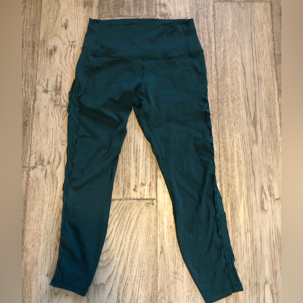 LULULEMON Size 10 High Times Essential Rhythm Lace Up Side Leggings Rare Green